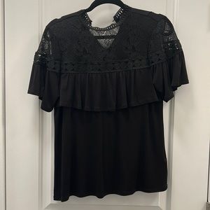 Beautiful lace neck and shoulder top.